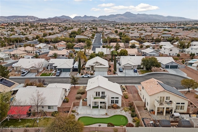 drone / aerial view featuring a mountain view