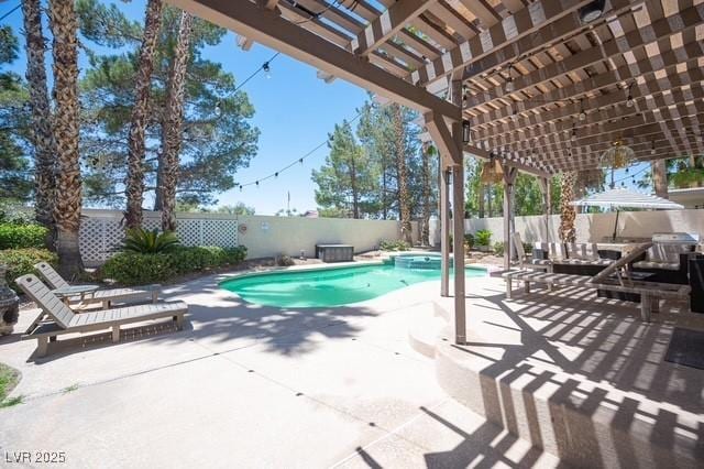 view of swimming pool featuring a patio and a pergola