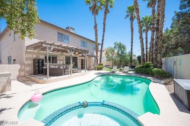 view of swimming pool featuring an in ground hot tub, a patio, and a pergola