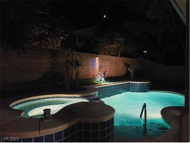 view of pool at twilight