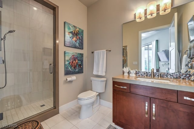 bathroom with vanity, a shower with shower door, tile patterned floors, and toilet