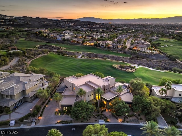 aerial view at dusk with a mountain view