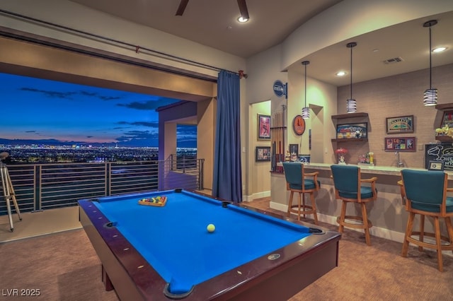 recreation room featuring ceiling fan, bar, billiards, and carpet