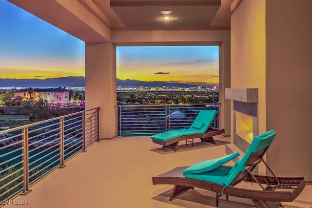 view of balcony at dusk