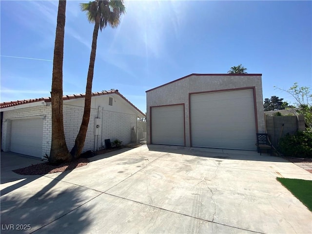 detached garage with fence