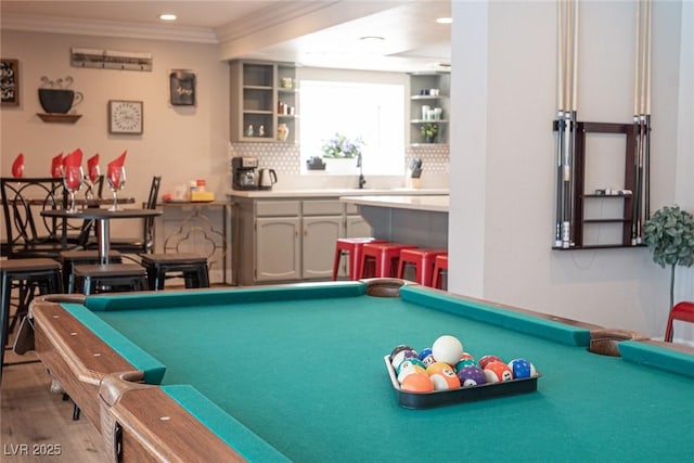 playroom featuring billiards, ornamental molding, wood finished floors, and recessed lighting