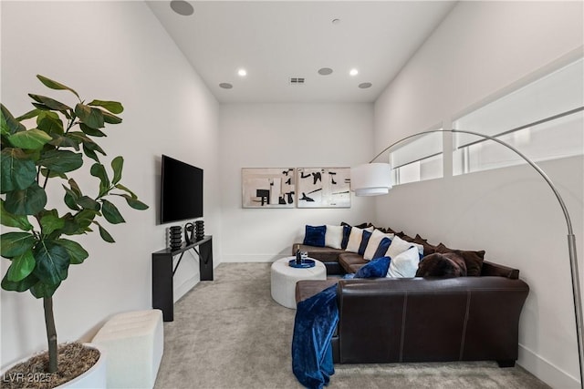 living room with light colored carpet