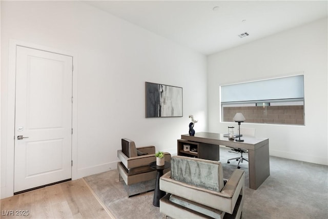 home office featuring light hardwood / wood-style floors