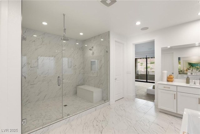 bathroom featuring vanity and walk in shower