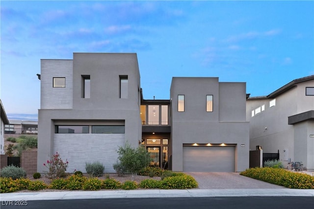 modern home featuring a garage