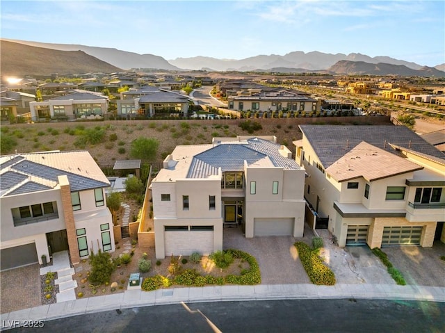 drone / aerial view featuring a mountain view