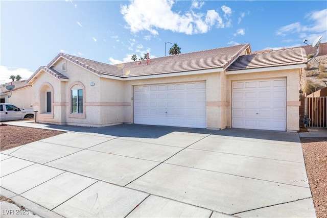 single story home with a garage