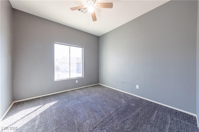 empty room with carpet and ceiling fan