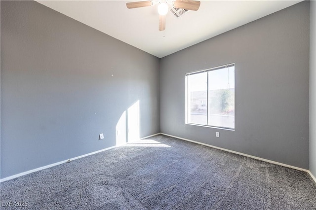 carpeted empty room with lofted ceiling and ceiling fan