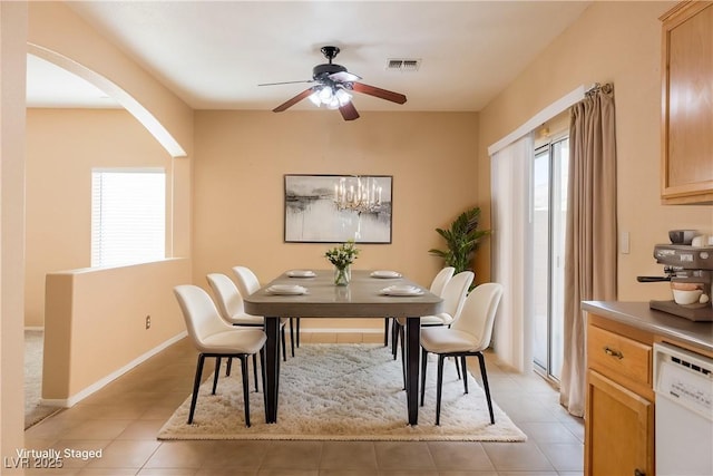 dining area featuring light tile patterned floors and ceiling fan