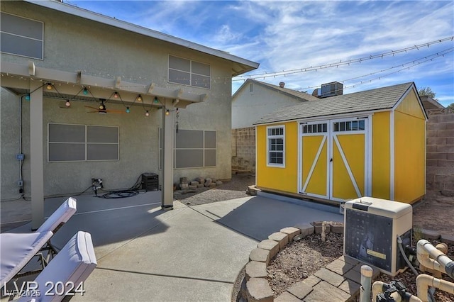 view of patio / terrace featuring a storage unit