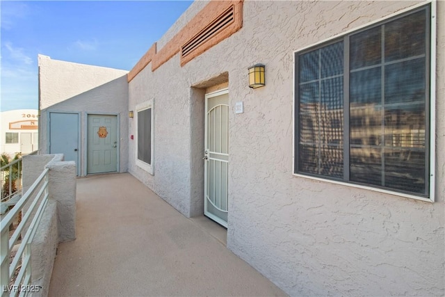 view of patio / terrace with a balcony