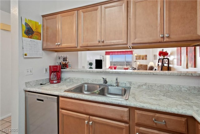 kitchen featuring sink and stainless steel dishwasher