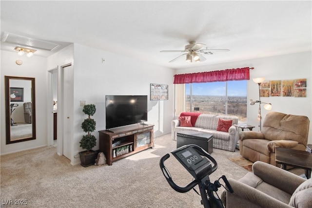 living room with ceiling fan and light carpet