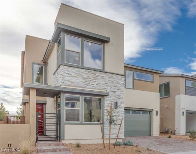 view of front of property featuring a garage