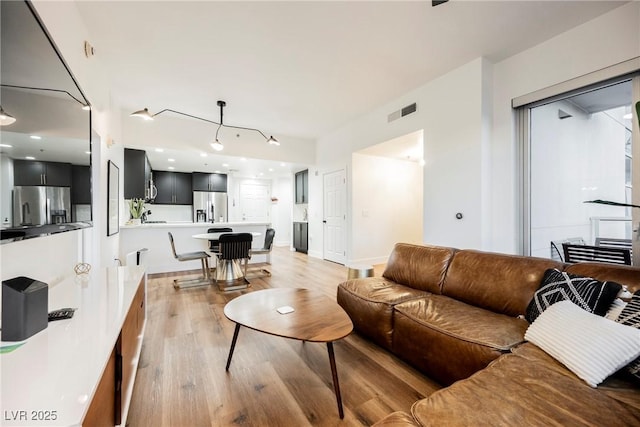 living room with light wood-type flooring