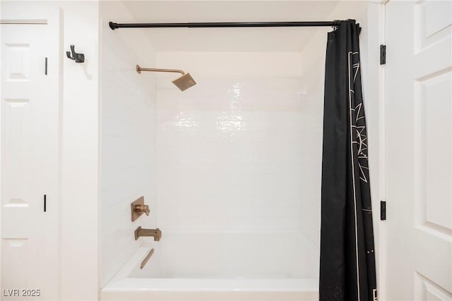 bathroom featuring shower / bathtub combination with curtain