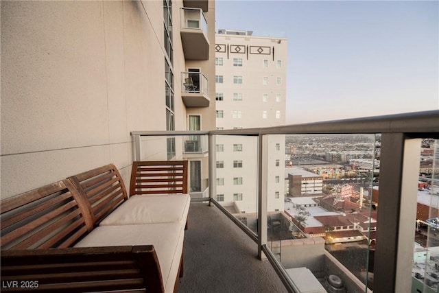 view of balcony at dusk