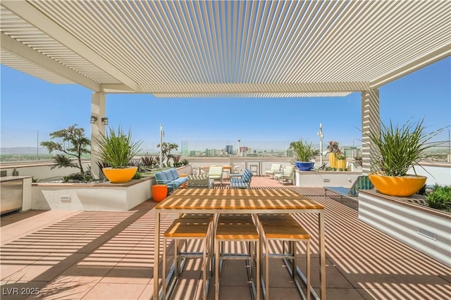 view of patio / terrace with an outdoor hangout area and a pergola