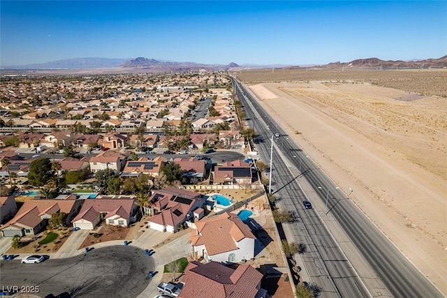 bird's eye view with a mountain view