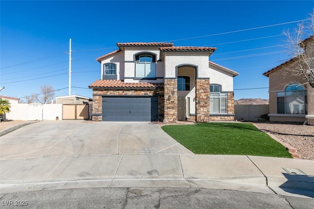 view of front facade with a garage and a front yard