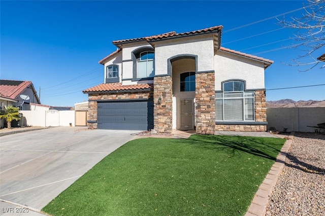 view of front facade featuring a garage and a front yard