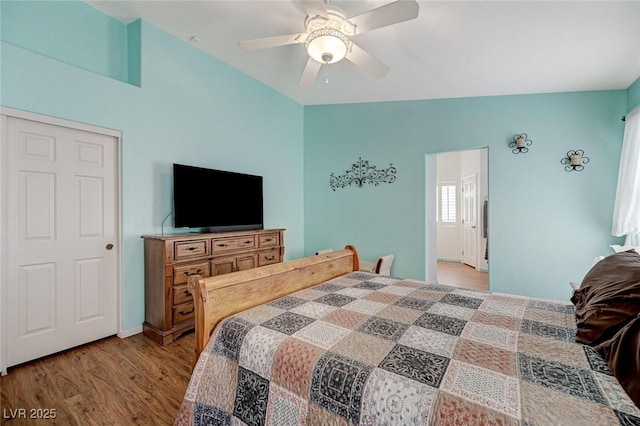 bedroom featuring light hardwood / wood-style flooring and ceiling fan