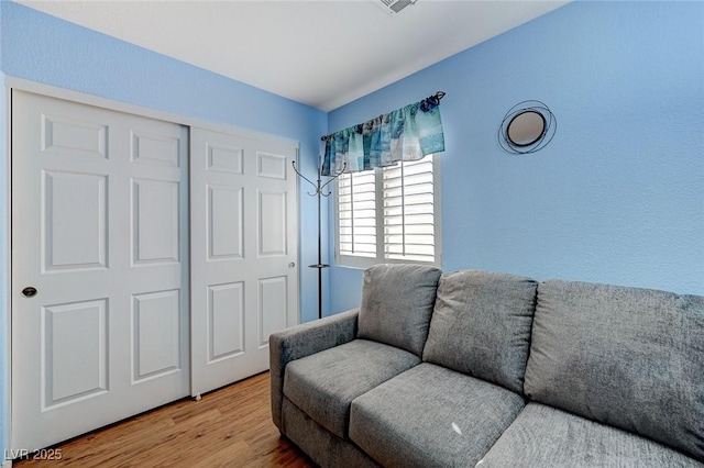 living room with hardwood / wood-style flooring