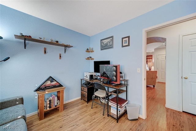 office space with light hardwood / wood-style flooring