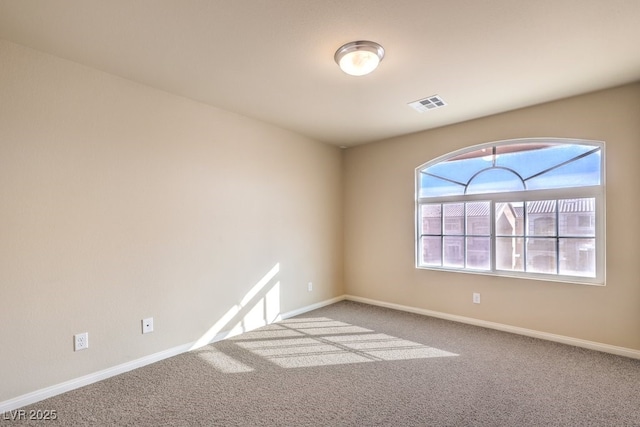 view of carpeted spare room