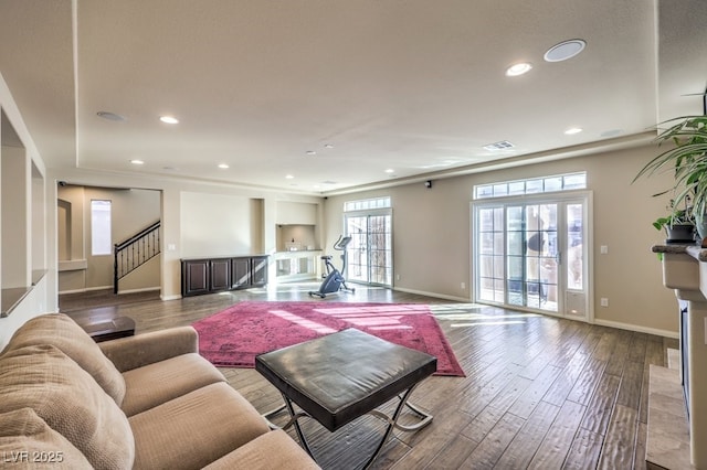 5490 Tulip Hill Ave, Las Vegas, NV 89141 - living room featuring baseboards, wood finished floors, recessed lighting, and stairs