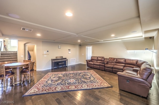 5490 Tulip Hill Ave, Las Vegas, NV 89141 - living area featuring arched walkways, stairway, wood finished floors, a wood stove, and recessed lighting