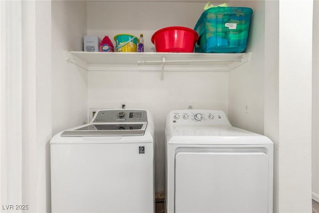 washroom with washer and clothes dryer