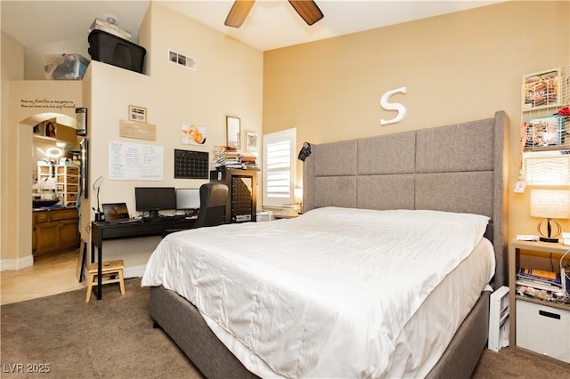 bedroom featuring ceiling fan, carpet, visible vents, and baseboards