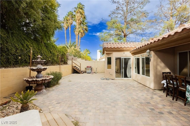 view of patio with fence