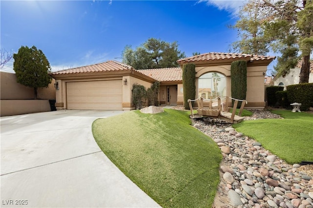 mediterranean / spanish-style house featuring a garage, a tile roof, concrete driveway, stucco siding, and a front yard