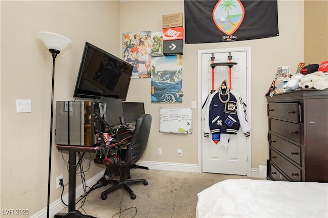 carpeted bedroom featuring baseboards