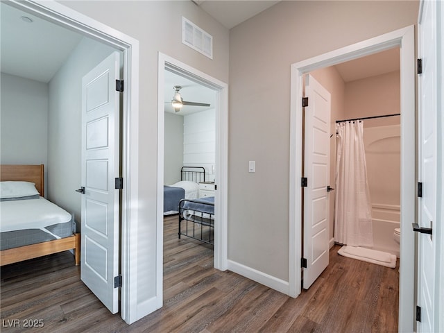 bedroom featuring dark hardwood / wood-style floors