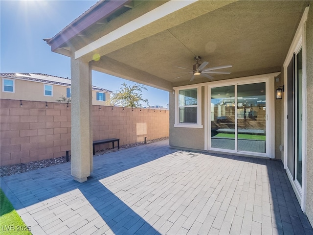 view of patio / terrace featuring ceiling fan