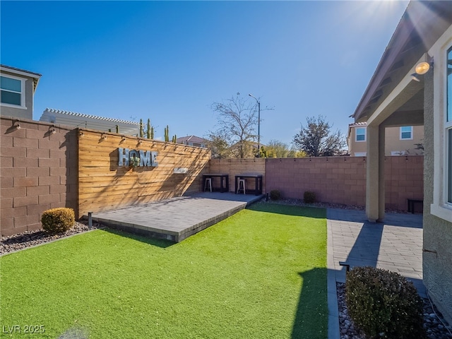 view of yard with a patio area