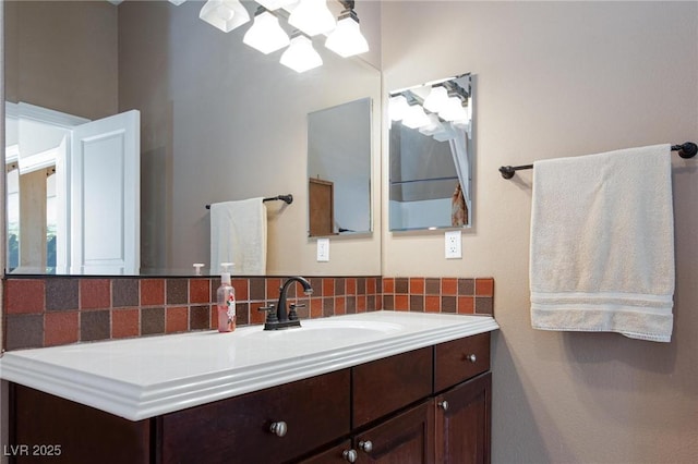 bathroom featuring backsplash and vanity