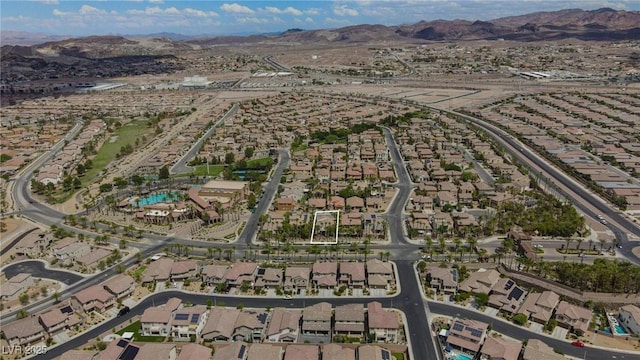 drone / aerial view featuring a mountain view and a residential view