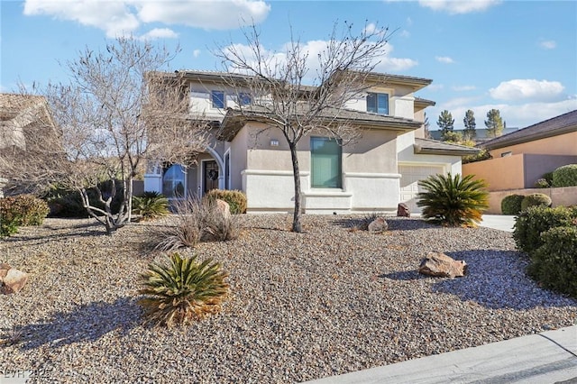 view of front of property with a garage