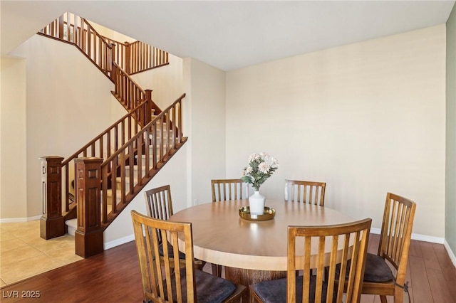 dining area featuring wood-type flooring