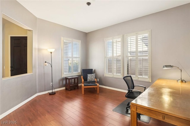 office space featuring dark wood-type flooring